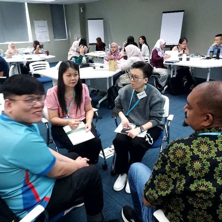 Participants in discussion at the stakeholder management training programme by Human Equation Malaysia